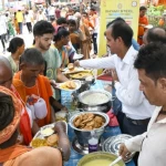 Daily Food Distribution for Pilgrims in Varanasi during Sawan