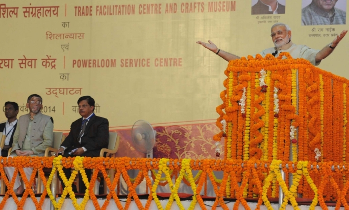 PM_Modi_speaking_after_laying_the_foundation_stone_of_the_Trade_Facilitation_Centre_and_Crafts_Museum,_and_inaugurating_the_Powerloom_Service_Centre_in_Varanasi